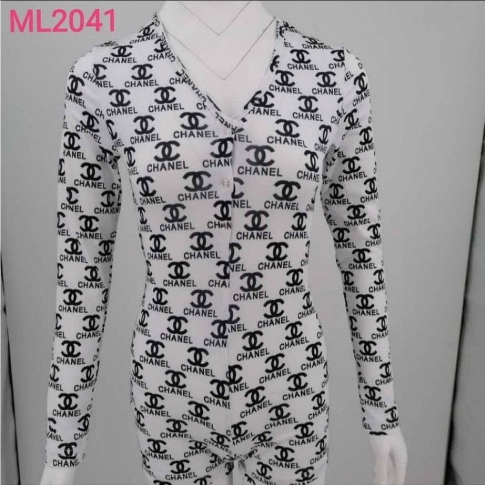 White and black designer onesie.